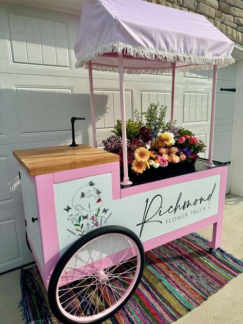 Pink and White Flower Cart with Flowers